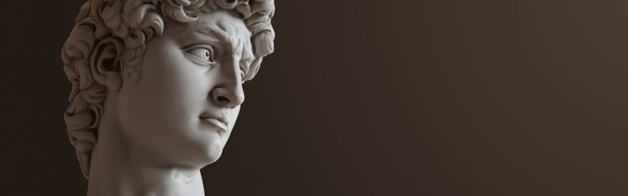 David sculpture by Michelangelo. Close up with dark background.